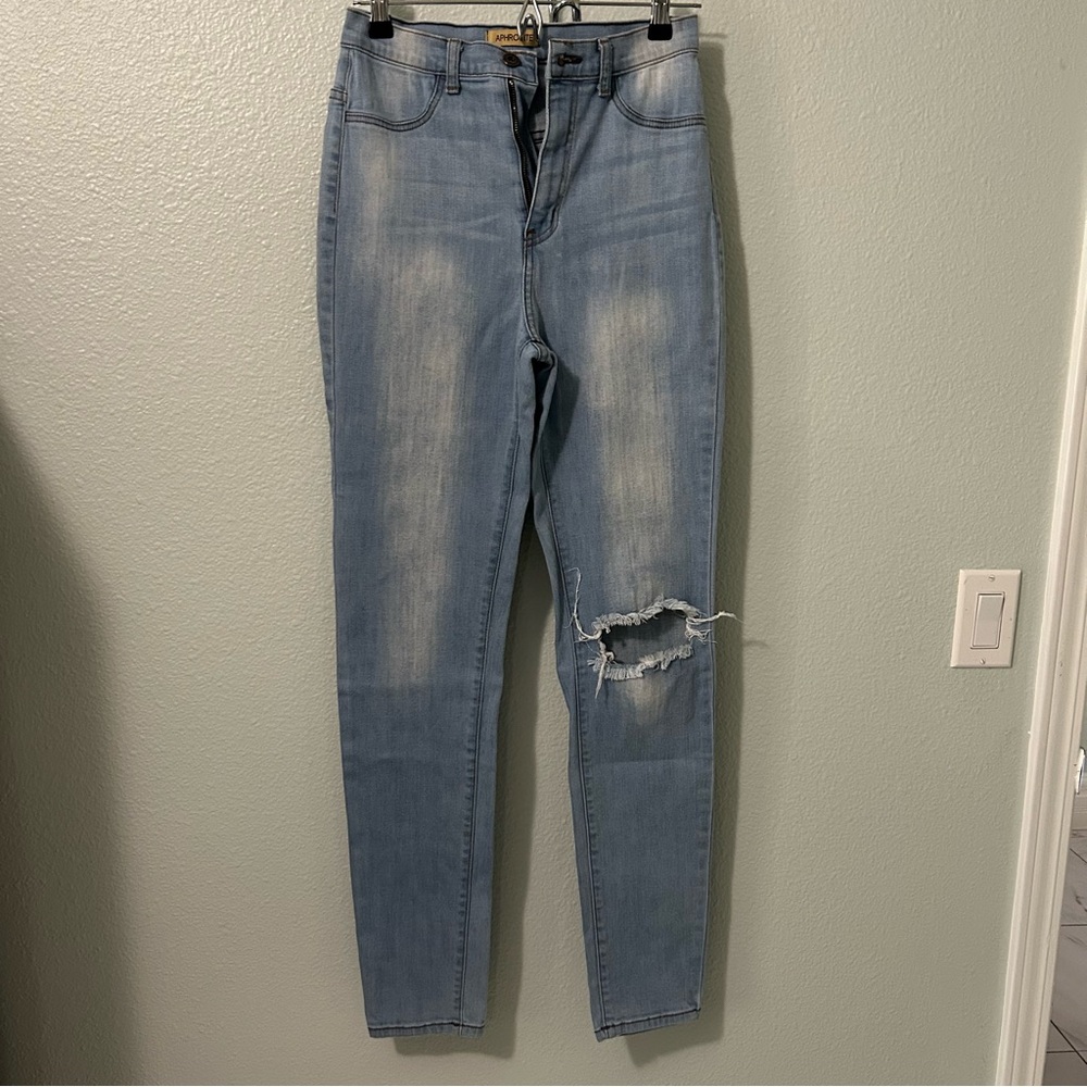 Aphrodite light washed ripped jeans